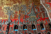 Myanmar, Burma, Nyaungshwe. Small Buddhas set into the temple wall, Shwe Yaunghwe Kyaung monastery, near Inle Lake. 